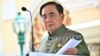 FILE - Thai prime minister Prayut Chan-ocha speaks to the press after a cabinet meeting at Government House in Bangkok on May 16, 2023. 