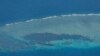 China, Philippines reach deal to stop clashes at fiercely disputed shoal  