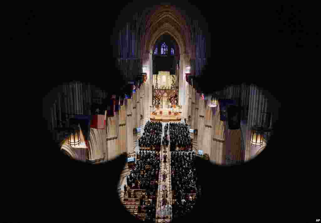 The casket of retired Supreme Court Justice Sandra Day O'Connor is escorted out of the Washington National Cathedral during a funeral service, Dec. 19, 2023, in Washington. O'Connor, an Arizona native and the first woman to serve on the nation's highest court, died on Dec. 1 at age 93.