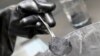FILE - Graphite powder is pictured in a Volkswagen pilot line for battery cell production in Salzgitter, Germany, May 18, 2022. Beijing in December is set to curb exports of graphite, a key material used in the making of batteries for electric vehicles.