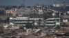 Hancurnya lahan pertanian dan bangunan di Jalur Gaza dilihat dari Israel Selatan, 22 Desember 2023. (Foto: AP)