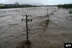 北京門頭溝區暴雨成災永定河氾濫。(2023年7月31日)