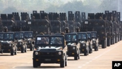 FILE - Military hardware is seen during a parade to commemorate Myanmar's 78th Armed Forces Day in Naypyitaw, Myanmar, March 27, 2023. The U.N. says Thai banks and firms are thwarting global sanctions against Myanmar's military.