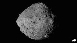 FILE - This undated image provided by NASA shows the asteroid Bennu seen from the OSIRIS-REx spacecraft.