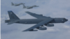 지난 2018년 9월 동중국해에서 미 공군 B-52H 전략폭격기와 일본 항공자위대 F-15 전투기가 연합 비행훈련을 하고 있다. 사진 = 미 공군.