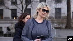 FILE - Nadine Menendez, wife of Senator Bob Menendez, leaves Manhattan federal court in New York, March. 21, 2024.