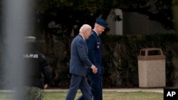 President Joe Biden arrives at Walter Reed National Military Medical Center in Bethesda, Md., Feb. 16, 2023, for his annual health exam. While declaring the president healthy, the examining physician noted “the President's gait remains stiff, but has not worsened since last year.”