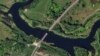 This satellite photo from Planet Labs PBC shows a destroyed bridge across the Seim River at the town of Glushkovo in Russia's Kursk region, Aug. 17, 2024. 