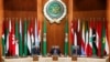 Secretary General of the Arab League Ahmed Aboul Gheit reacts next to Egypt's Foreign Minister Sameh Shoukry during the opening session of the meeting of Arab foreign ministers, to discuss the Syrian situation and Sudan crisis, in Cairo, Egypt, May 7, 2023.
