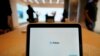 A Meta Portal Go is displayed at a Meta Store in Burlingame, Calif., May 4, 2022. A deep dive into political ads on Facebook by Syracuse University researchers has revealed a sprawling web of advertisements that contain misleading information or scams. 
