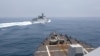 從美國海軍鍾雲號伯克級導彈驅逐艦的甲板上可以看到中國海軍旅洋III號導彈驅逐艦在台灣海峽附近駛過。 （2023年6月3日）