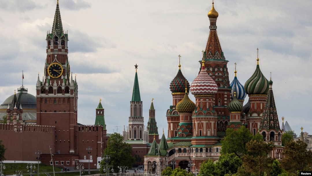 FILE - A general view on the Spasskaya tower of the Kremlin and St. Basil's Cathedral in Moscow, May 16, 2024. 