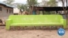Kenyan Entrepreneur Turns Plastic Bottles Into Eco-Bricks