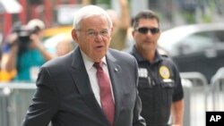 FILE - Then-U.S. Senator Bob Menendez enters federal court in New York, July 15, 2024. He resigned from the Senate the following month.