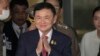 FILE - Thailand's former Prime Minister Thaksin Shinawatra arrives at Don Muang airport in Bangkok, Thailand, Aug. 22, 2023.