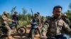 This photo taken on December 10, 2023 shows members of the Mandalay Peoples Defense Forces (MDY-PDF) heading to the frontline. (AFP)