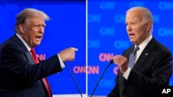 Kombinacija fotografija republikanskog predsedničkog kandidata, bivšeg predsednika SAD Donalda Trampa, i kandidata demokrata, aktuelnog predsednika SAD Džoa Bajdena, tokom debate čiji je domaćin bio CNN, 27. juna 2024. u Atlanti.