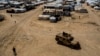 Iraq repatriates nearly 700 more citizens linked to Islamic State group from Syrian camp