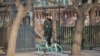 A Chinese paramilitary police stands guard outside the British embassy in Beijing on Jan. 8, 2024.