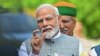 Perdana Menteri India Narendra Modi berbicara kepada awak media ketika tiba di Gedung Parlemen India di New Delhi, pada 18 September 2023. (Foto: AFP/Money Sharma)