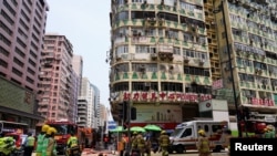 香港九龍一棟老舊商住大樓著火，至少5人死亡。 （2024年4月10日）