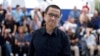 Director Lou Ye is pictured during a photo call for the film "An Unfinished Film," presented as part of Special Screenings at the 77th Cannes Film Festival in Cannes, France, May 17, 2024.