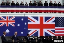 U.S. President Joe Biden, Australian Prime Minister Anthony Albanese and British Prime Minister Rishi Sunak deliver remarks on the Australia - United Kingdom - U.S. (AUKUS) partnership, after a trilateral meeting, at Naval Base Point Loma in San Diego, California U.S. March 13, 2023. (REUTERS/Leah Millis)