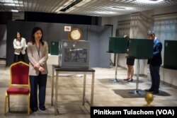 Voters cast vote at polling booth inside the Royal Thai Embassy, Washington, DC, April 28, 2023