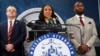 Fulton County District Attorney Fani Willis, center, speaks at the Fulton County Government Center during a news conference, in Atlanta, Georgia, Aug. 14, 2023.