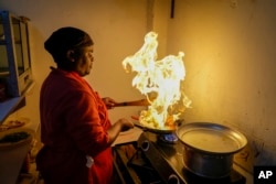 Chef and owner Mark Kioko works in the kitchen of his restaurant in Kitengela, on the outskirts of the capital Nairobi, Kenya, April 17, 2023.