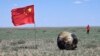 Wahana Chang'e 6 di Siziwang Banner, Daerah Otonomi Mongolia, China utara, Selasa, 25 Juni 2024. Wahana Chang'e 6 China telah kembali ke Bumi bersama sampel batuan dan tanah dari sisi jauh bulan yang jarang dijelajahi. (Bei He/Xinhua via AP)