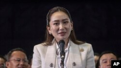 ထိုင်းလွှတ်တော်က ဝန်ကြီးချုပ်သစ်အဖြစ်တင်မြှောက်လိုက်တဲ့ ပေထုံတန် ရှင်နာဝတ်ကို Pheu Thai ပါတီ ဌာနချုပ် သတင်းစာရှင်းလင်းပွဲအတွင်းတွေ့ရစဉ် (ဩဂုတ် ၁၆၊ ၂၀၂၄)
