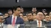 FILE - Move Forward party leader Chaithawat Tulathon, right, flanked by its former leader Pita Limjaroenrat, talks to reporters during a news conference at parliament in Bangkok, Thailand, on Jan. 31, 2024.