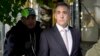 Michael Cohen, mantan pengacara dan perantara politik Donald Trump, dalam perjalanan untuk memberi kesaksian di pengadilan Manhattan, New York, Senin 13 Mei 2024.