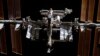Russian satellite breaks up, forces space station astronauts to shelter
