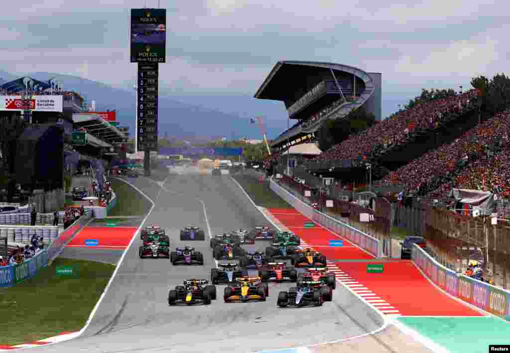 Red Bull's Max Verstappen, McLaren's Lando Norris and Mercedes' George Russell lead the Formula 1 Spanish Grand Prix at the Barcelona Catalunya racetrack in Montmelo, near Barcelona, Spain.
