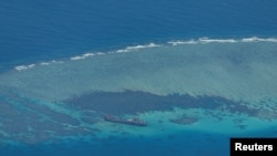2023年3月9日，空拍圖顯示，"馬德雷山脈號」在南中國海有爭議的第二托馬斯淺灘上。（路透社）