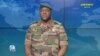 Kanali Abdoulaye Maiga, msemaji wa serikali ya Mali, akisoma taarifa kwenye kituo cha televisheni kinachomilokiwa na serikali Julai 31, 2023. Picha na ORTM / AFP. 
