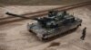 FILE - Polish soldiers train with a K2 tank purchased from South Korea at a military range near Orzysz, Poland, March 30, 2023. South Korea may reconsider its ban on sending arms to Ukraine following a Russia - North Korea mutual defense treaty.
