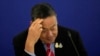 FILE - Thailand's Prime Minister Srettha Thavisin talks to media during a news conference at the government house in Bangkok, April 10, 2024. 