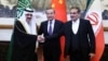 Diplomat senior China Wang Yi memediasi pertemuan Menteri Negara dan Nasional penasihat keamanan Arab Saudi Musaad bin Mohammed Al Aiban (kiri) dan Ali Shamkhani (kanan), sekretaris Dewan Keamanan Nasional Tertinggi Iran, selama pertemuan di Beijing, China 10 Maret 2023.