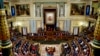 Spain's King Felipe VI, center, gives a speech during the new opening session of the Spanish parliament in Madrid, Nov. 29, 2023. Miguel Angel Oliver Fernández nominated to head the state-run EFE is due to appear before a parliamentary commission on Dec. 21, 2023.