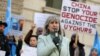 FILE - Helena Kennedy, a member of the House of Lords, speaks at a vigil in London, Feb. 13, 2023, protesting the planned visit to the UK of Erkin Tuniyaz, governor of the Xinjiang Uyghur Autonomous Region.