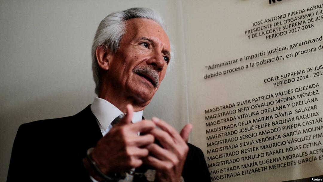 FILE - Journalist José Rubén Zamora, founder and president of El Periódico newspaper, talks with reporters as he attends a court hearing in Guatemala City, Guatemala, Dec. 8, 2022. 