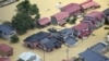 Heavy rain in northern Japan triggers floods and landslides