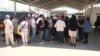 Migran dari negara-negara Asia Tengah bekas Uni Soviet tampak antre di perbatasan Meksiko-AS untuk mencari suaka (foto: dok). 