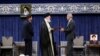 Reformist formally takes over as Iran's president after supreme leader offers endorsement 