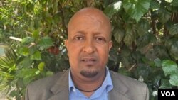 ቀሲስ በላይ መኮነን