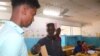 A voter casts his ballot during the parliamentary election in Djibouti city on Feb. 24, 2023.