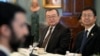 FILE - Chinese diplomat Liu Jianchao, center, during a meeting with Secretary of State Antony Blinken at the State Department in Washington, Jan. 12, 2024.